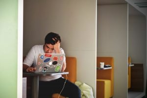 Student on laptop cheating