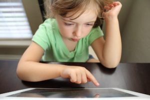 girl using iPad small